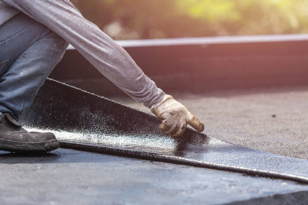 Professional Basement Waterproofing technician working in Adamsville, TN